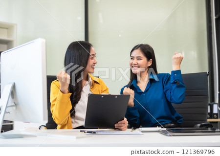 businessteam creative woman coworker in office Happy to be successful partnership teamwork success. businessteam creative woman coworker in office Happy to be successful partnership teamwork success. 121369796