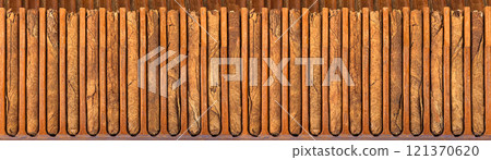 Cigars in wooden box 121370620