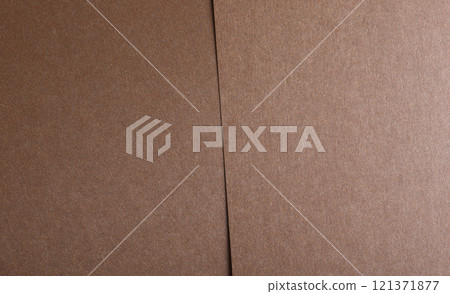 Brown paper background. Smooth and textured surface with a rustic and natural feel, perfect for Brown paper background. Smooth and textured surface with a rustic and natural feel, perfect for 121371877