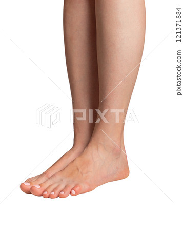 Naked female legs. Slim and smooth, showcasing beautiful skin and wellness care. isolated on white 121371884
