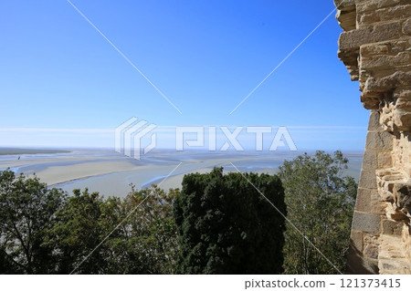 View of the tidal flats from Mont Saint-Michel Abbey at low tide 121373415