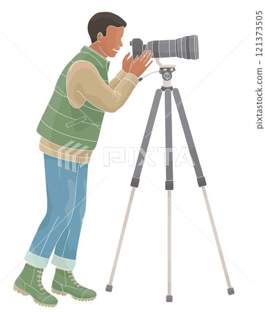 African American man birdwatching with telephoto camera on tall tripod in outdoor clothes 121373505
