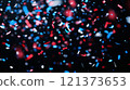 Colorful confetti celebration with red, white, and blue pieces floating in air. Generative AI 121373653