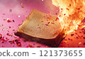 Book engulfed in flames with colorful sparks swirling around it. Generative AI 121373655