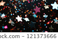 Colorful star-shaped confetti scattered on a dark surface for celebration. Generative AI 121373666