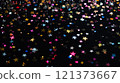 Colorful star confetti falling against a dark background during a celebration. Generative AI 121373667
