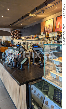 Starbucks Checkout: Display of Gift Cards at Counter 121374527