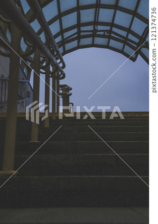 Exit from the underpass in the evening. Cloudy sky. Steps up 121374736