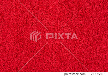 Red terry cloth as a background macro photo. 121375413
