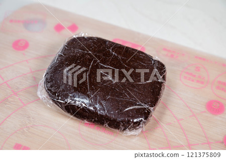 Cocoa cookie dough chilled in the refrigerator 121375809