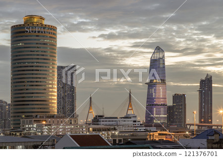 Evening view after sunset of Skyscraper in the business district in the beautiful sky background. 121376701