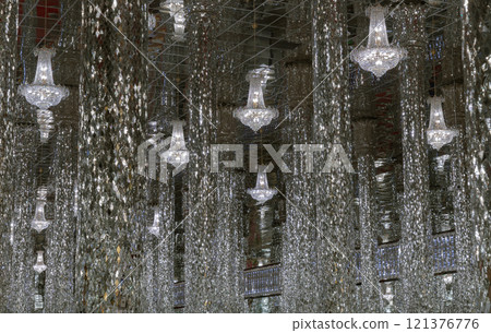View of Chandeliers ceiling reflection of Shining glittering lighting. 121376776