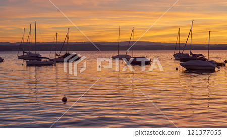 Bodensee Lake Sunrise Panorama. Morning Sunlight Over Tranquil Waters. 121377055