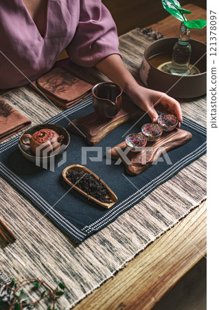 Enjoy the Traditional Tea Ceremony that comes with an exquisite set of elegant tea accessories Enjoy the Traditional Tea Ceremony that comes with an exquisite set of elegant tea accessories 121378097