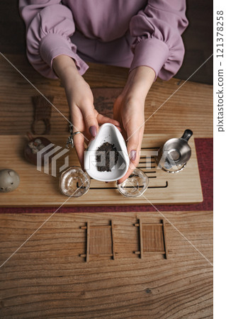 Engaging in a delightful Tea Preparation Ritual using Unique Teaware for every occasion 121378258
