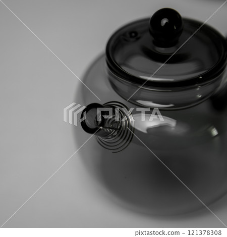 A Stylish and Modern Glass Teapot that Features a Unique and Intriguing Spout Design A Stylish and Modern Glass Teapot that Features a Unique and Intriguing Spout Design 121378308