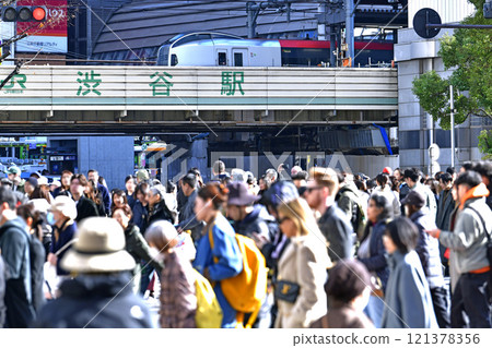 Tokyo Cityscape in Japan SERIES E259 logo Narita Express and Shibuya Station crowded with foreigners... 121378356