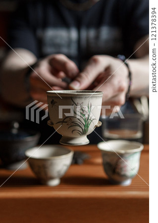 Participate in a captivating Tea Ceremony using exquisite, Traditional Chinese Tea Cups Participate in a captivating Tea Ceremony using exquisite, Traditional Chinese Tea Cups 121378394