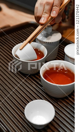 The Tea Ceremony An Exquisite Traditional Pouring Process Utilizing Elegant Crockery The Tea Ceremony An Exquisite Traditional Pouring Process Utilizing Elegant Crockery 121378442