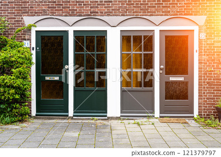 Typical dutch door. Dutch holland architectural detail, a door in Netherlands city. Dutch door Typical dutch door. Dutch holland architectural detail, a door in Netherlands city. Dutch door 121379797