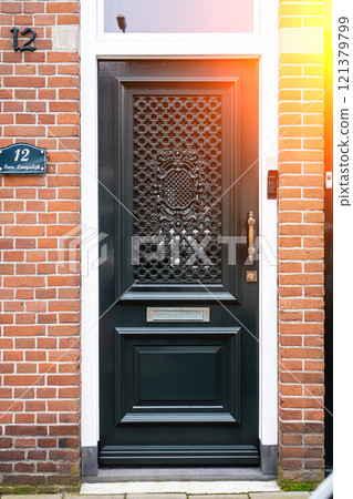 Typical dutch door. Dutch holland architectural detail, a door in Netherlands city. Dutch door 121379799