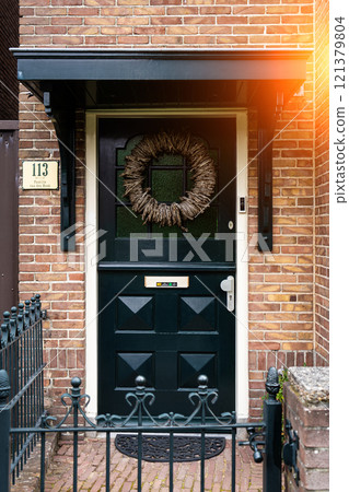 Typical dutch door. Dutch holland architectural detail, a door in Netherlands city. Dutch door 121379804