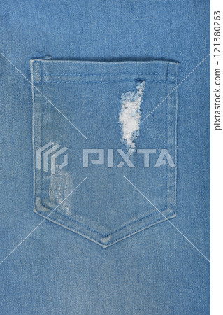 Close-up Pocket of a denim shirt. 121380263
