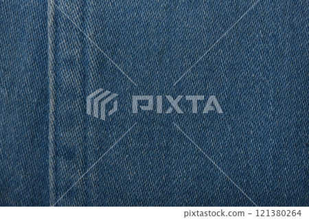 Denim fabric with blue thread seams, denim jacket, denim pants, for background or fabric sample sale. Denim fabric with blue thread seams, denim jacket, denim pants, for background or fabric sample sale. 121380264