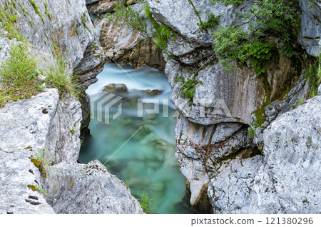 View from above of a beautiful blurred soca river 121380296
