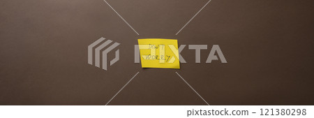 Yellow post it paper with a Dont worry sign on it 121380298