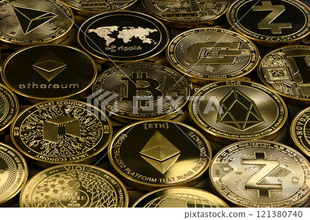 Golden Cryptocurrency on keyboard laptop, Bitcoin , Ethereum, Litecoin, Dashcoin, XRP, EOS, NEO, TRX, Monero, Zcach, Iota and Ripple coins. Golden Cryptocurrency on keyboard laptop, Bitcoin , Ethereum, Litecoin, Dashcoin, XRP, EOS, NEO, TRX, Monero, Zcach, Iota and Ripple coins. 121380740