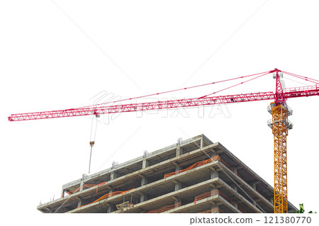 Under construction high multi-storey building with tower type construction crane isolated on transparent white background. Blank for industry, real estate investment at stage of construction of walls Under construction high multi-storey building with tower type construction crane isolated on transparent white background. Blank for industry, real estate investment at stage of construction of walls 121380770