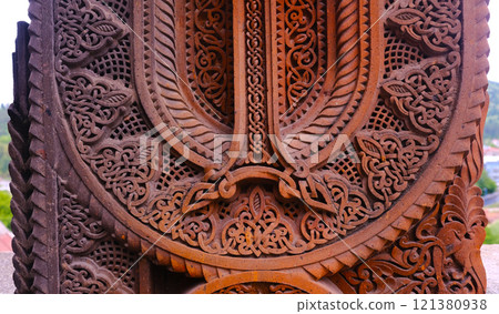 An Intricately Carved Wooden Panel Featuring Ornate Patterns That Captivate the Eye An Intricately Carved Wooden Panel Featuring Ornate Patterns That Captivate the Eye 121380938