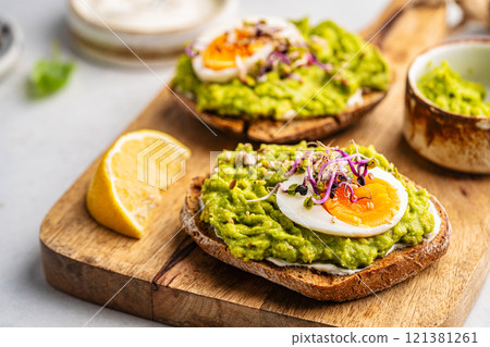 Toast with avocado 121381261