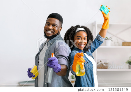 Young African American Couple Posing At Home During Spring Cleaning, Doing Household Chores Together, Copy Space 121381349