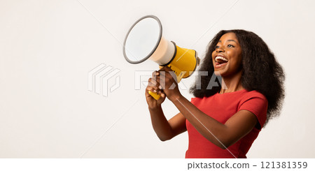 Great Promo. Excited Black Lady Using Megaphone For Making Announcement, Cheerful African American Woman Holding Loudspeaker, Sharing News While Standing On White Background, Panorama, Copy space Great Promo. Excited Black Lady Using Megaphone For Making Announcement, Cheerful African American Woman Holding Loudspeaker, Sharing News While Standing On White Background, Panorama, Copy space 121381359