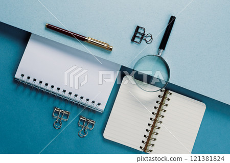 Set of stationery tools on a blue background, flatlay Set of stationery tools on a blue background, flatlay 121381824