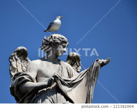 Statue of Angel with the Sudarium on the Sant Angelo bridge, Rome, Italy 121382004