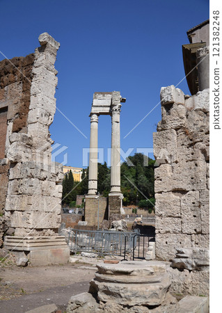 Ionic Columns of the Temple of Saturn in the Forum Romanum, Rome, Italy, clear blue sky sunny day 121382248