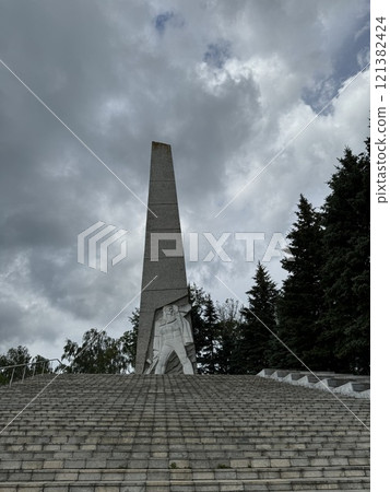 Monument with Towering Obelisk and Carved Figures Monument with Towering Obelisk and Carved Figures 121382424