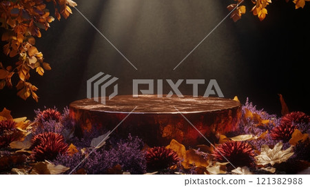 In a serene forest setting, a round wooden pedestal stands illuminated by soft, warm light. It is surrounded by colorful autumn leaves and various flowers, creating a magical atmosphere. 121382988