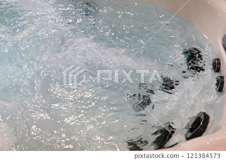 cascading high-pressure clear water jet in individual bath . 121384573
