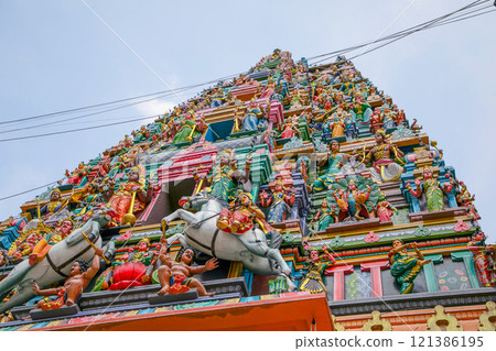 traditional small buddhist temple in kuala lumpur with many figures on facade traditional small buddhist temple in kuala lumpur with many figures on facade 121386195
