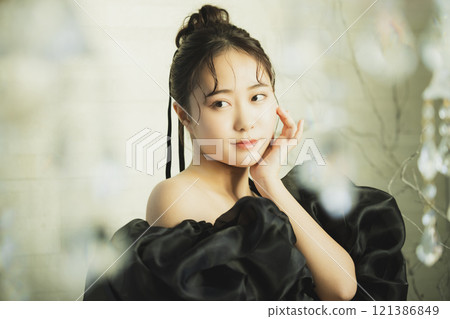 A woman in a black dress A woman in a black dress 121386849