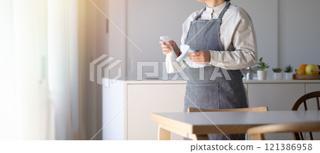 Clean with disinfectant spray 121386958