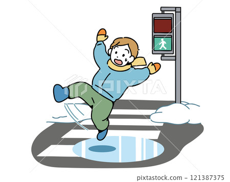 A boy slips and falls on a snowy crosswalk 121387375