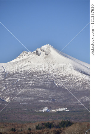Photographing the snowy Mount Sawara from Shikabe Town, Hokkaido in winter 121387630