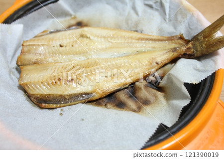 Atka mackerel cooked in a microwave oven Atka mackerel cooked in a microwave oven 121390019