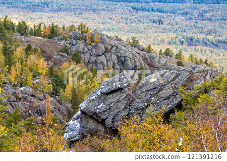 Rocky mountain ranges in autumn forest Rocky mountain ranges in autumn forest 121391216