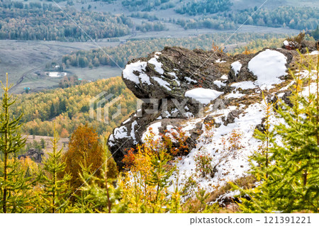 Rocky mountain and autumn forest in cloudy weather 121391221